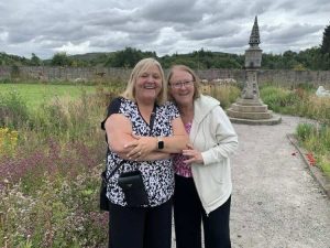 Two female veterans pose at our BBQ at Linburn