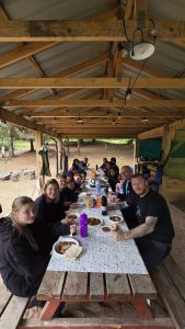 Veterans and their families sat around a long table eating dinner