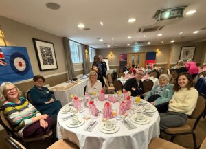Group of female veterans sat at a table