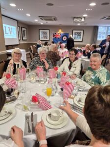 Group of female veterans sat at a table