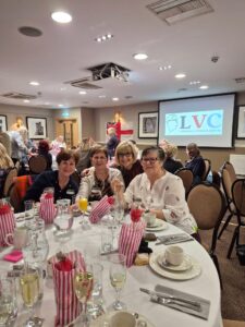 Group of female veterans sat at a table