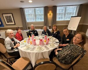 Group of female veterans sat at a table