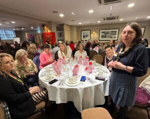 Group of female veterans sat at a table
