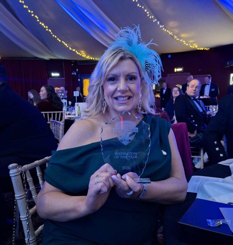 Female Veteran and CEO, Pauline, with her winner trophy at the Scottish Veterans Awards