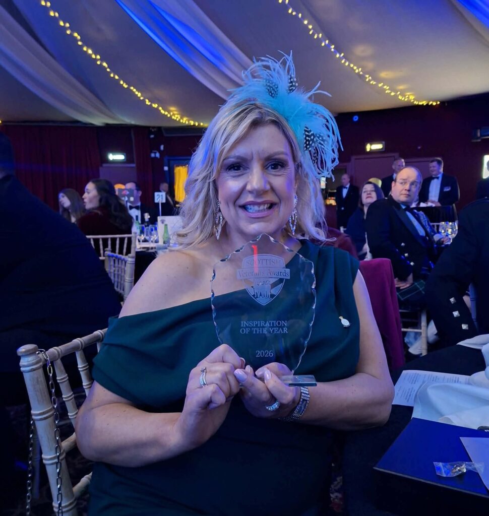 Female Veteran and CEO, Pauline, with her winner trophy at the Scottish Veterans Awards